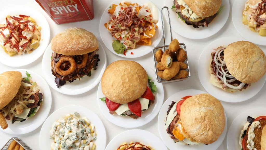 variety of gourmet burgers and sides on display