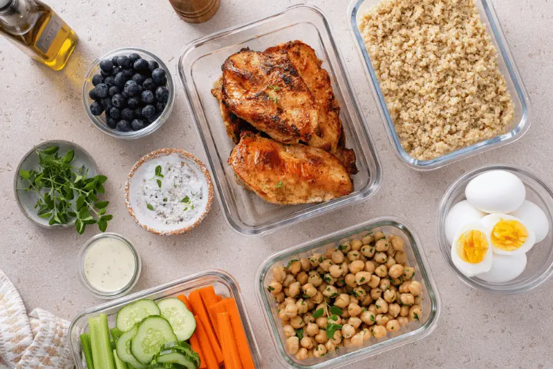 High-protein meal prep with chicken, eggs, chickpeas, quinoa, and vegetables for medical weight loss in Albuquerque